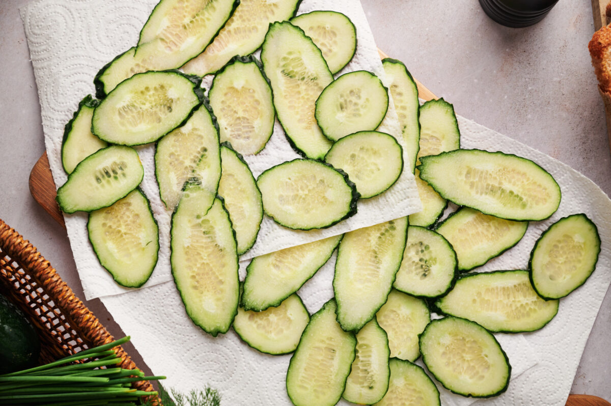 Slices of cucumber on paper towels.