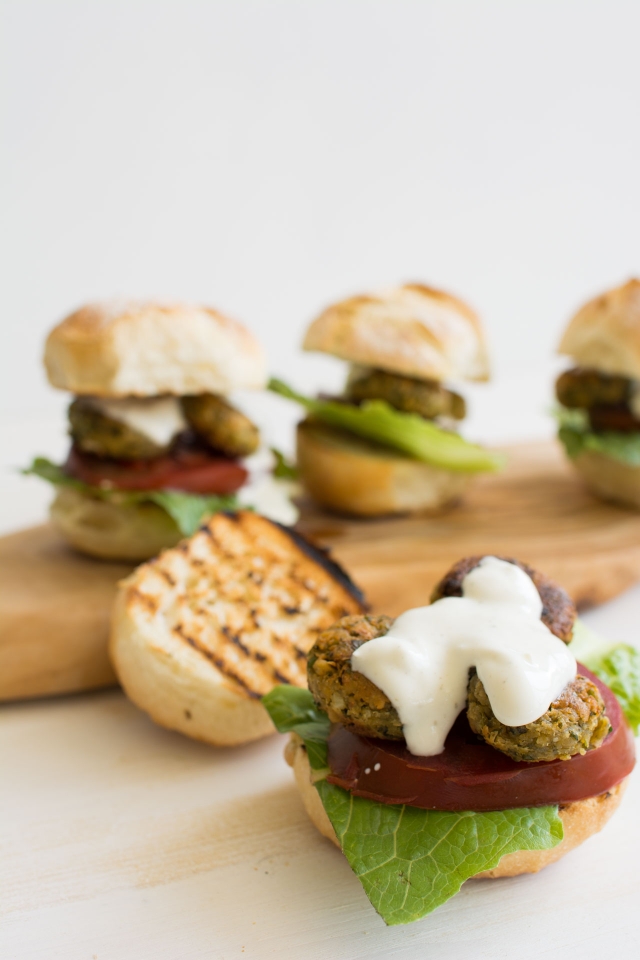 Easy, homemade falafel, stuffed into the most delicious burgers you'll ever have. Healthy, vegetarian and so easy, you can have it on the table in under 40 minutes! From Lauren Caris Cooks