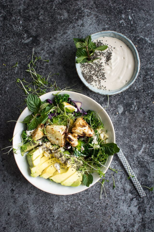 Start off the year with a simple roasted cauliflower detox bowl with a creamy, tahini sauce!