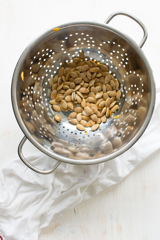 A simple and thorough guide to roasting your own pumpkin seeds at home. Click through for the healthiest, most addictive snack you ever made at home!