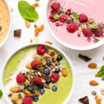 A variety of smoothie bowls on a white background.